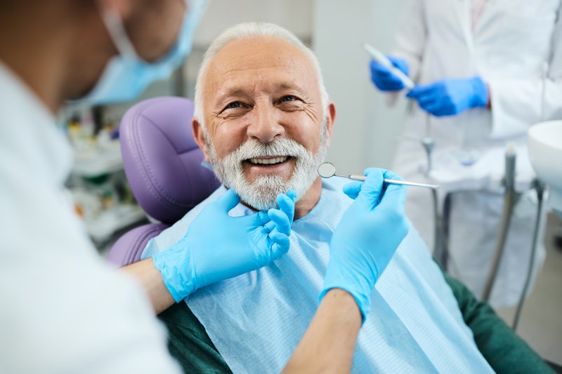 Man smiling with dentures